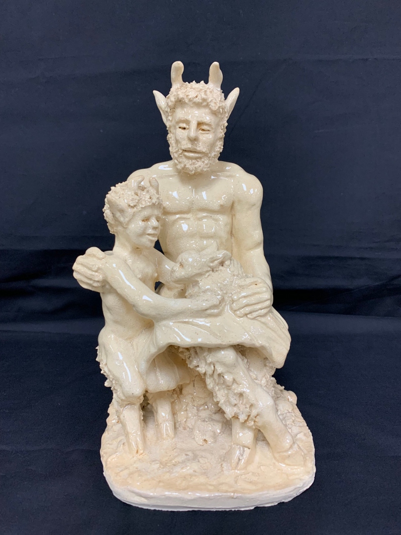 Product Description: Satyr's Gift to Son</br></br>James Fatata</br></br>10.5x5x6</br></br>2023</br></br>Stoneware Clay</br></br>$550</br> Satyr's Gift to Son by James Fatata